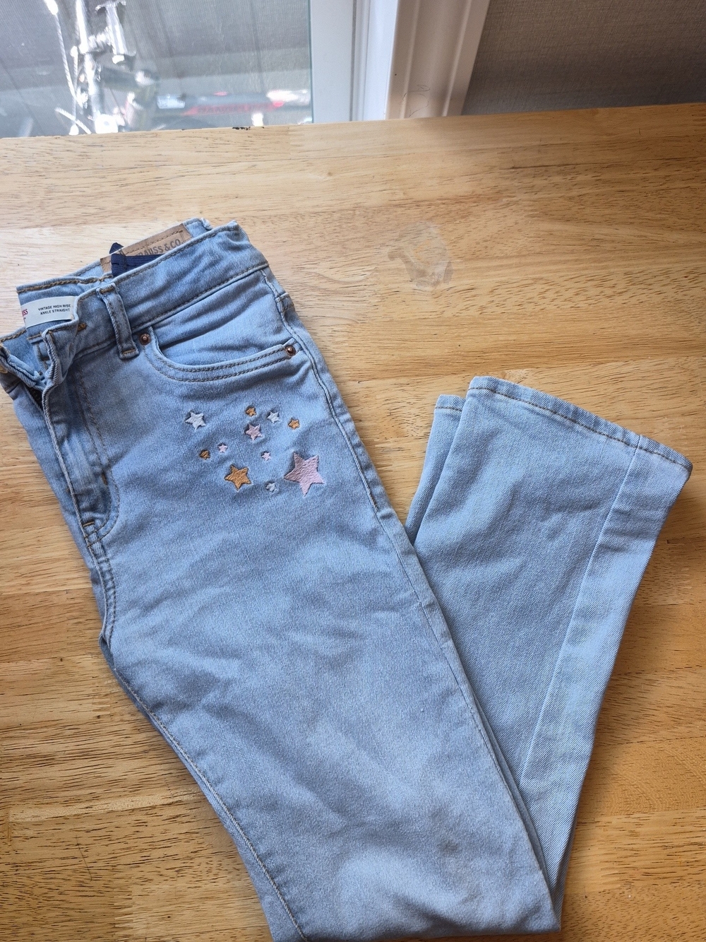 Levi's Light Wash High-Rise Jeans with Star Embroidery